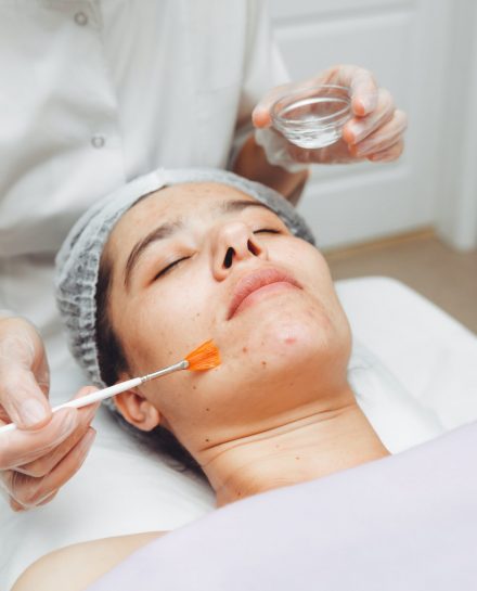 A,Cosmetologist,Does,Facial,Care,And,Apply,A,Face,Mask.